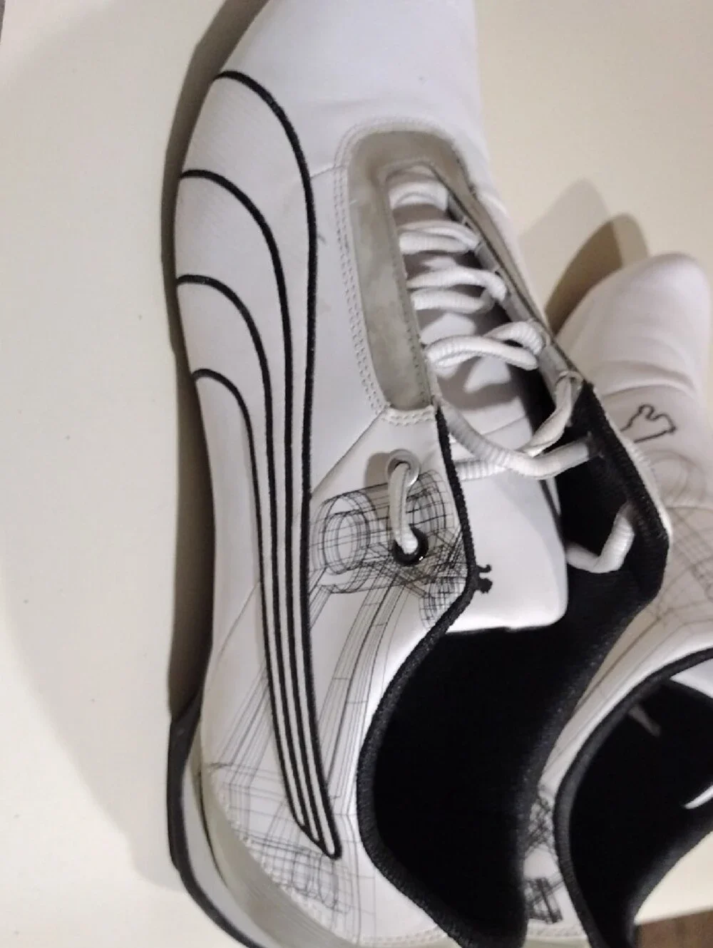 Men's Puma Future Cat S1 White Sneakers with Black Logos and Graphic Details